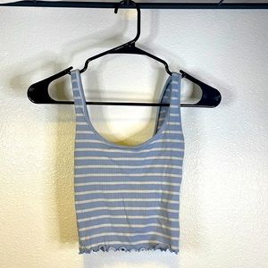 Striped crop top with ruffles on bottom.